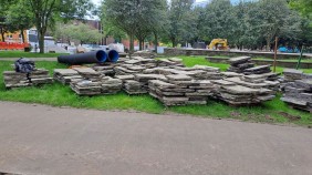 Stacked flag stones in the centre of All Saints Park